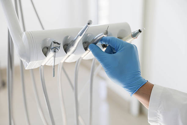 Professional Root Canal Treatment technician working in Lexington, MO